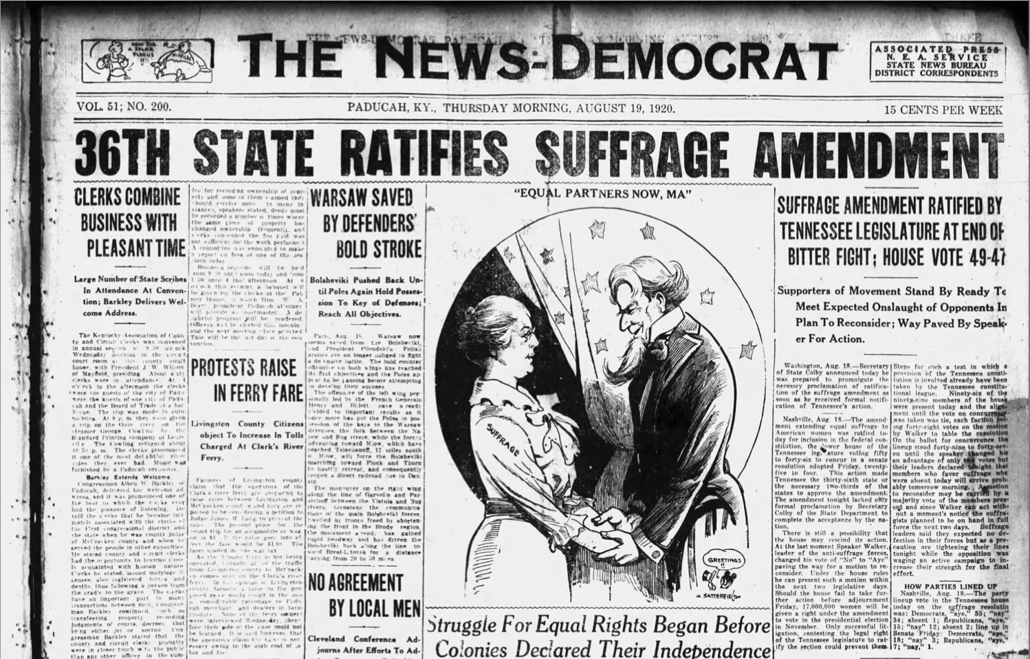 A public domain photograph showing a political cartoon or newspaper headline from 1920 celebrating the ratification of the 19th Amendment. The image should be from a public domain source to be used legally.
