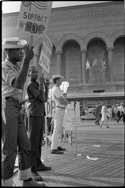 [African American and white supporters of the Mississippi Freedom Democratic Party holding signs in front of the convention hall at the 1964 Democratic National Convention, Atlantic City, New Jersey ]