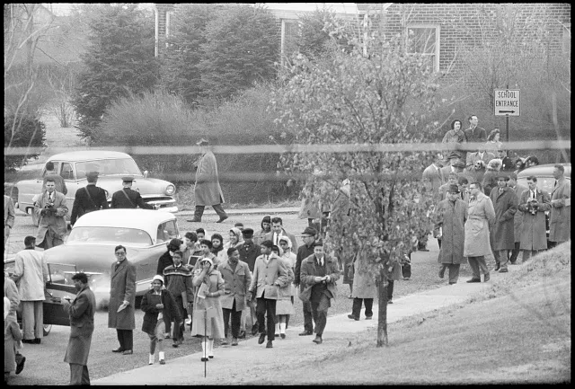 [African American students and others outside Warren County High School, Front Royal, Virginia, during school integration]