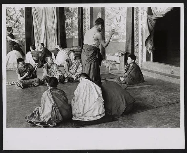 [Buddhist monks inside temple, Sikkim]
