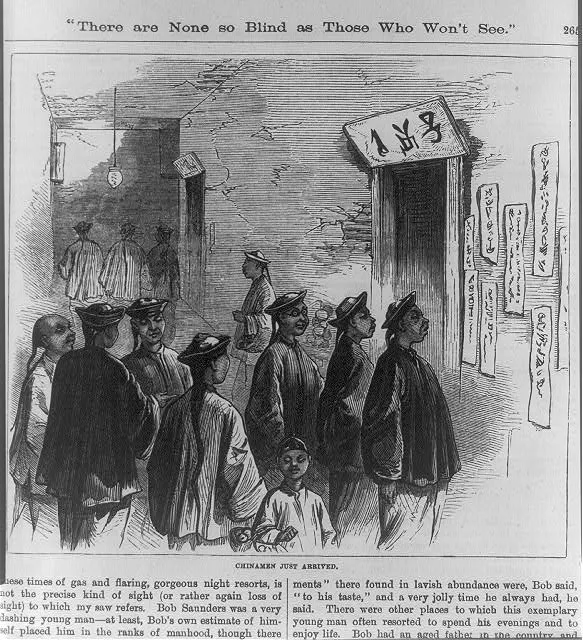 [Chinese immigrants to United States: newly arrived group reading signs]