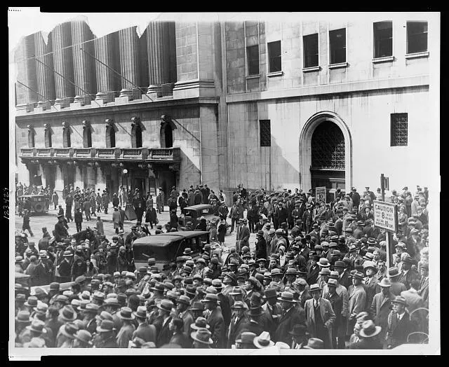 [Crowd of people gather outside the New York Stock Exchange following the Crash of 1929]