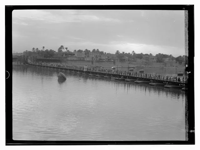 [Iraq. (Mesopotamia). Baghdad. River scenes on the Tigris. The Maude Bridge over the Tigris. Open for river traffic. A distant view]