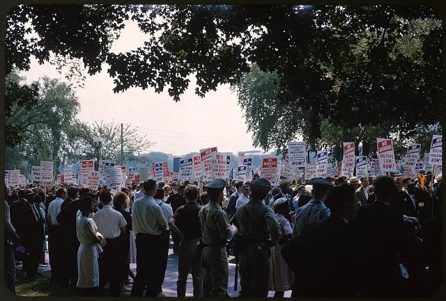 [People holding signs and marching during the March on Washington]