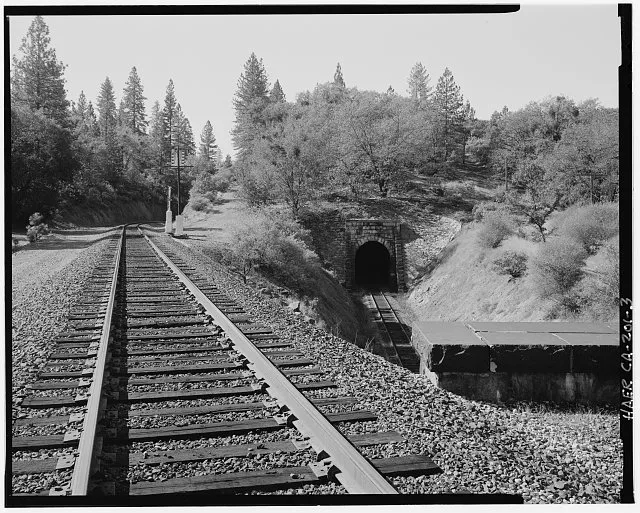 3.  East portal of Tunnel 25, contextual view to southwest from atop Tunnel 26 (HAER CA-202), with the original Central Pacific Transcontinental line passing above the new line, 135mm lens. - Central Pacific Transcontinental Railroad, Tunnel No. 25, Milepost 133.09, Applegate, Placer County, CA