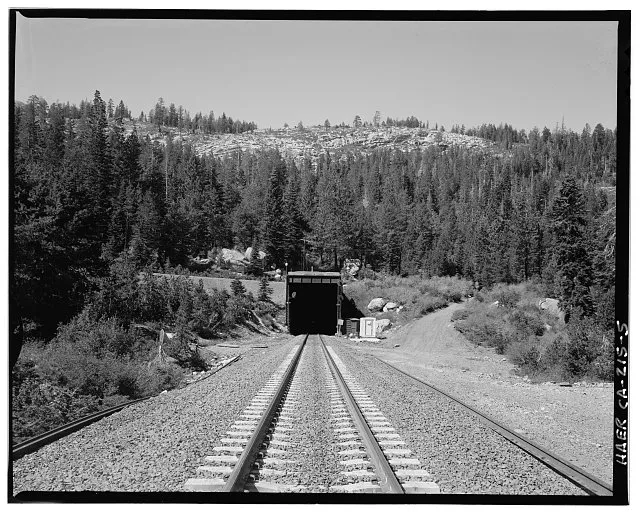 5.  East portal of Tunnel 41, contextual view to west-northwest, 135mm lens. Summit of Mount Judah, named for the visionary engineer who conceived and mapped the route of the first transcontinental railroad, rises above the tunnel. - Central Pacific Transcontinental Railroad, Tunnel No. 41, Milepost 193.3, Donner, Placer County, CA