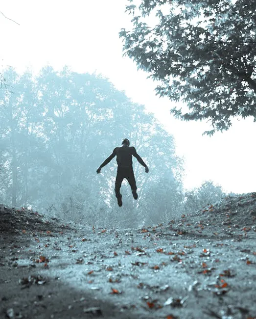 A mysterious figure appears to hover amid a foggy forest setting, creating a surreal atmosphere.