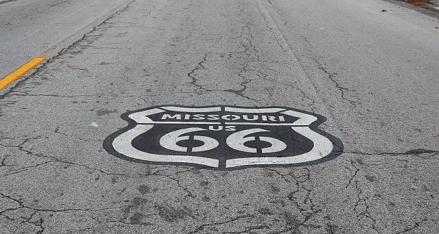 An insignia on College Street in Springfield, Missouri, reminding those who pass that a portion of the historic two-lane U.S. Route 66 still zigs and zags through town