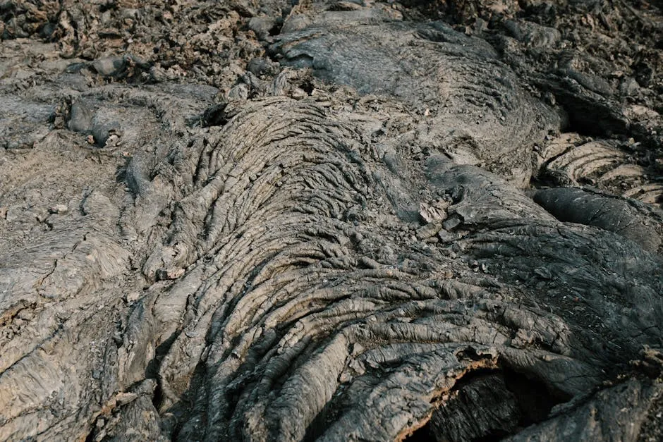 Detailed view of cooled lava patterns in Kamchatka, showcasing geological textures and formations.
