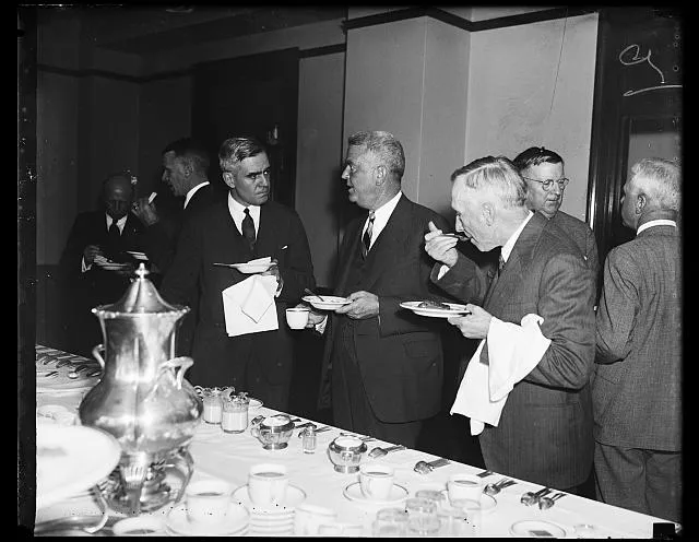 Explaining New Deal. From the left, W. Dale Clark of Omaha; Lyman E. Wakefield, of Minneapolis, and Thomas R. Preston, Chattanooga, all directors of the U.S. Chamber of Commerce, photographed at the luncheon which interrupted the 