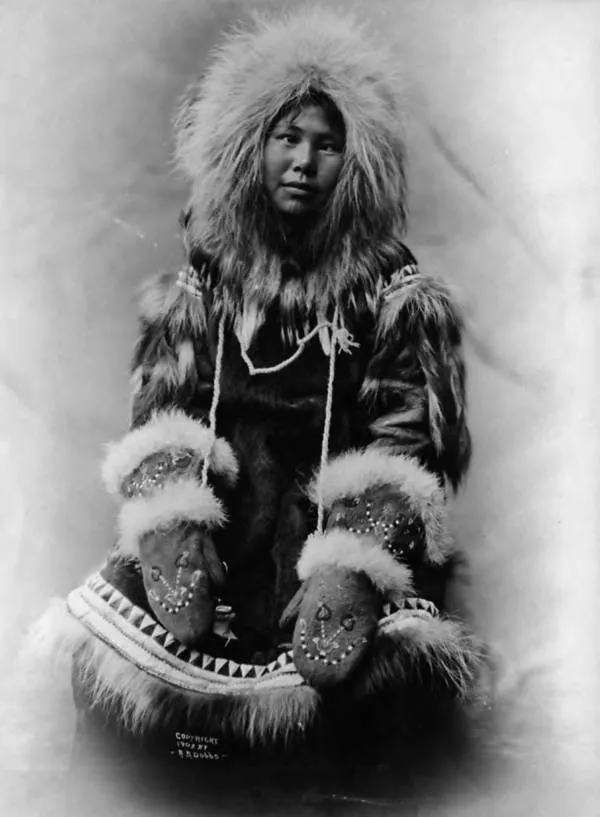 Inuit woman, Anawa, wearing fur parka with embroidered mittens, Alaska, 1903 (AL+CA 4911)