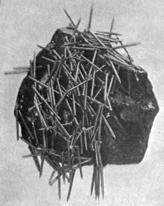 Lodestone attracting nails