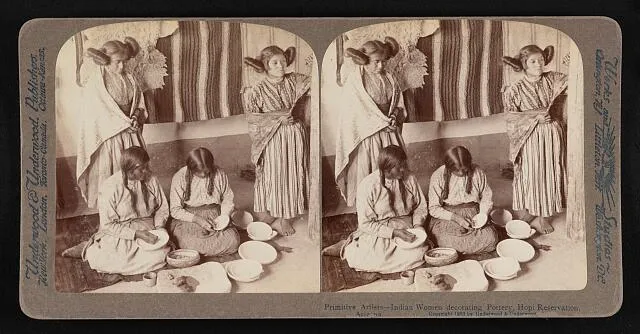 Primitive artists--Indian women decorating pottery, Hopi Reservation, Arizona
