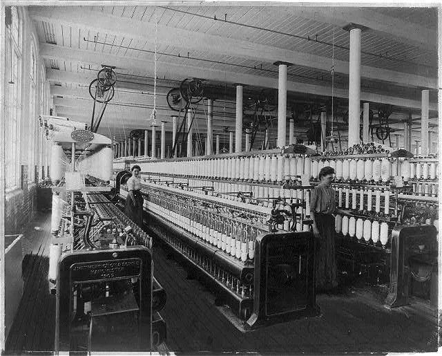 Textile factory with two women at machines