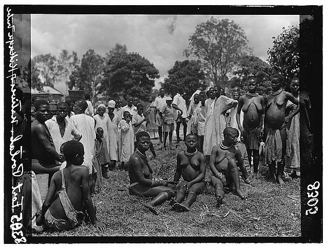 Uganda. From Hoima to Fort Portal. Types in the native market